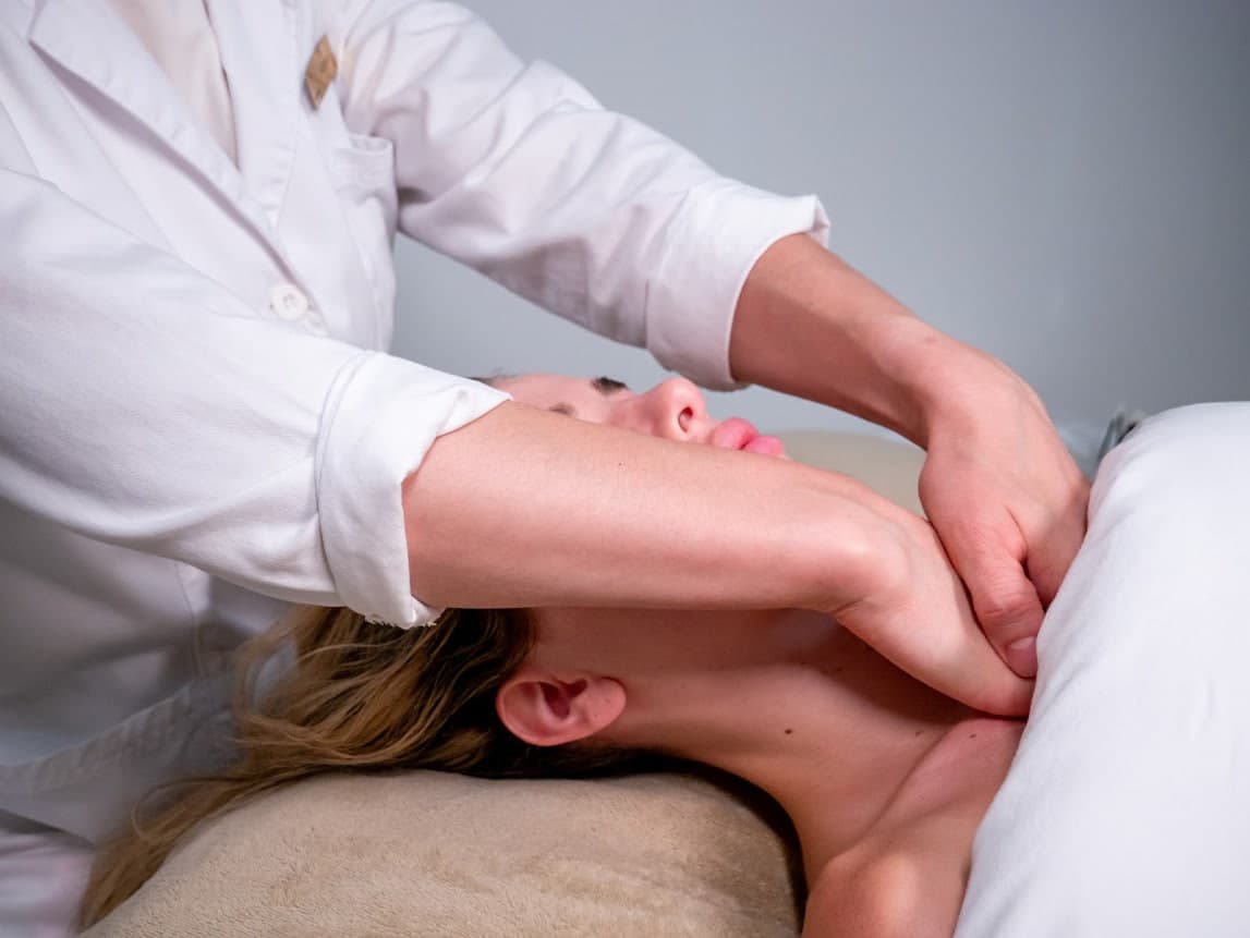 Sculpting massage along the jawline